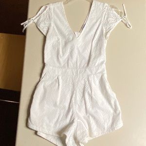 Lace Express romper with tie in back